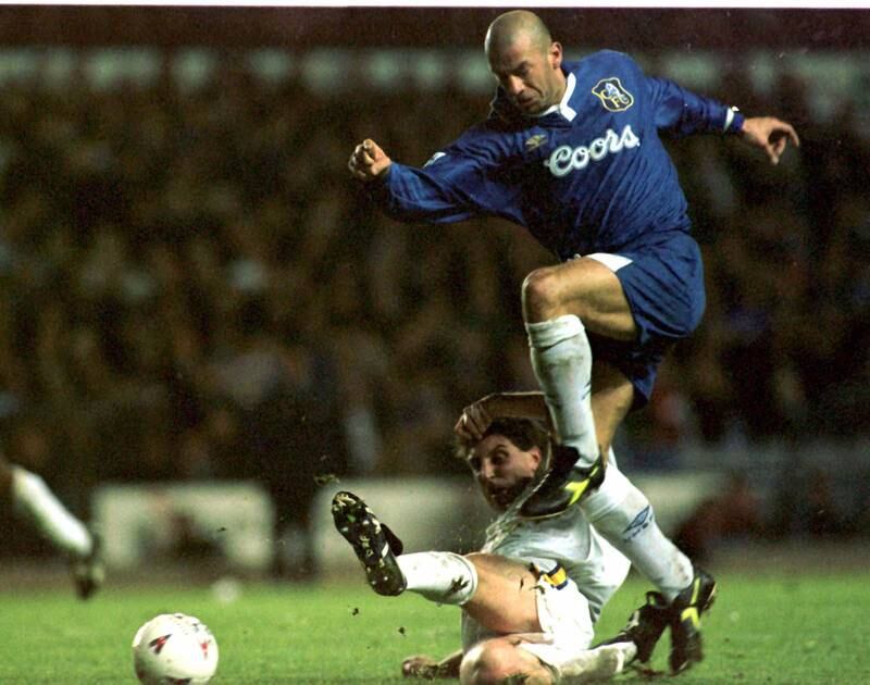 Gianluca Vialli makes a run at the Leeds United goal as Paul Beesley attempts a tackle. Reuters