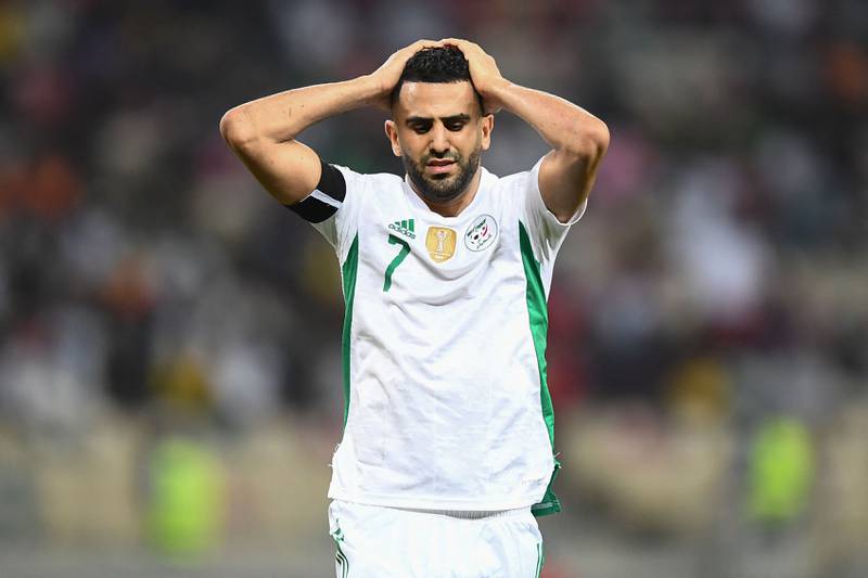 Algeria forward Riyad Mahrez reacts after Algeria missed a free kick. AFP