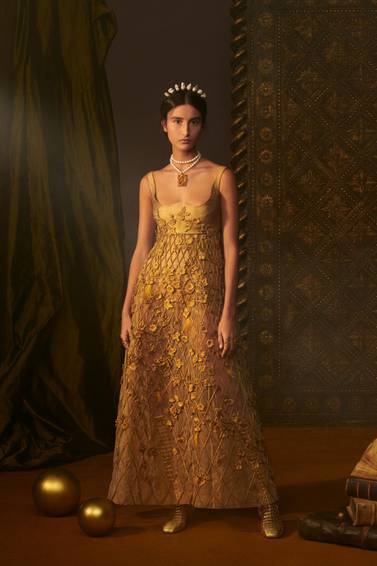 Sheathed in spun gold, this dress shows the extraordinary skill of the Dior haute couture atelier. Courtesy Dior