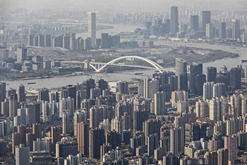 China dominates the list of wealthiest cities, with Shanghai in ninth place. Bloomberg