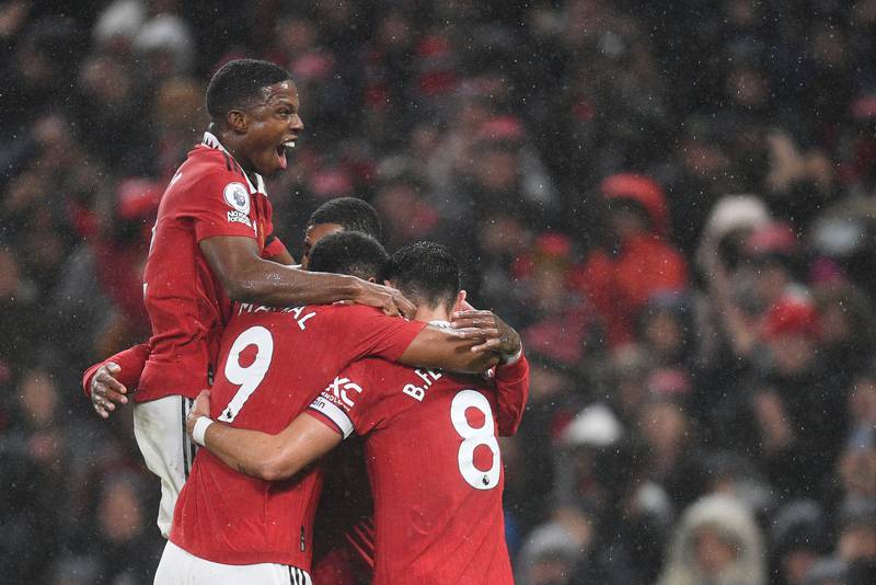 Anthony Martial celebrates with teammates after scoring. AFP