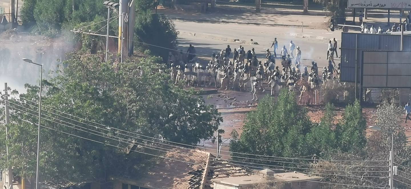 Security forces fire tear gas at protesters in Khartoum. Reuters