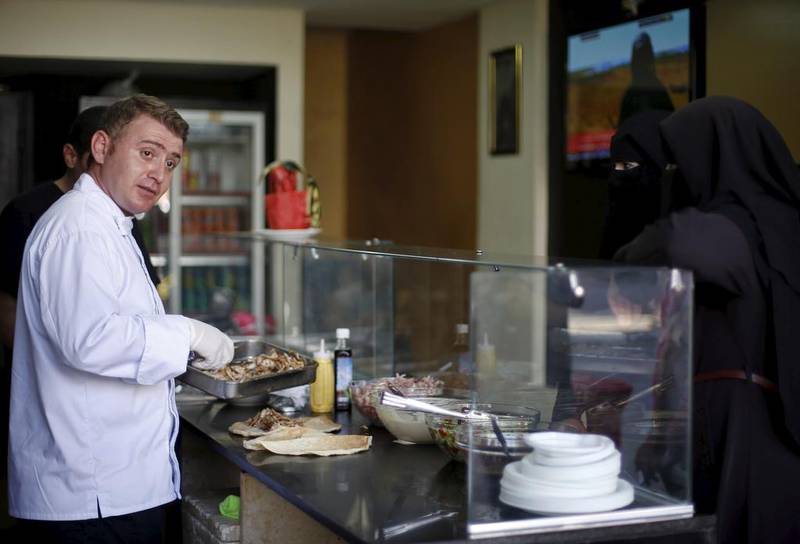 Syrian chef Warif Kasem cooking at Soryana, his restaurant  in Gaza City, Gaza, on  June 14, 2015. Mohammed Salem / Reuters