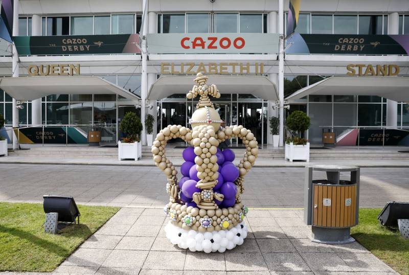A decorative crown made of balloons in front of the newly renamed Queen Elizabeth Stand at Epsom Racecourse, Surrey. PA 