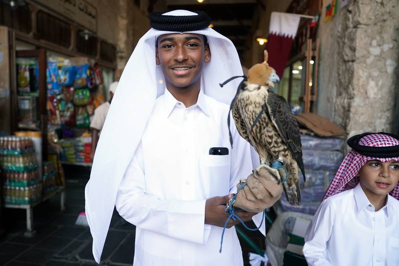 Residents, both with and without feathers, are enjoying the World Cup atmosphere. PA