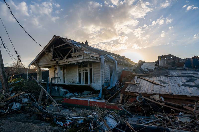 A tornado-damaged home is seen among the wreckage in the Arabi neighbourhood in New Orleans, Louisiana. Getty Images / AFP