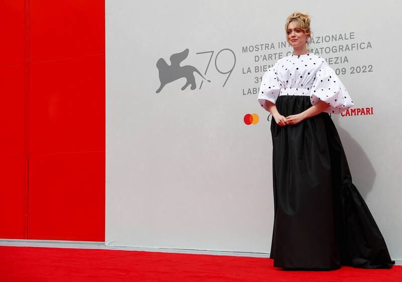 Aimee Lou Wood wore a polka dot ensemble by Patou for the screening of 'Living'. Reuters 