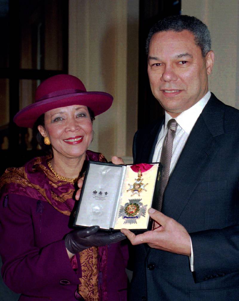 Powell and his wife display the Honarary Knight Commander, of the Order of Bath, which he received from Britain’s Queen Elizabeth II in December 1993. Reuters