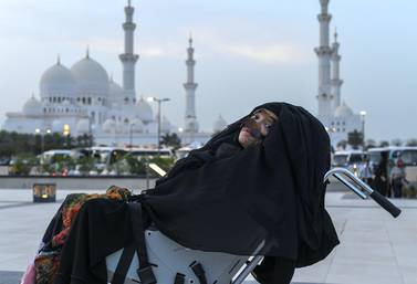 Munira Abdulla, who has woken from a 27-year-long vegetative state, visited the at Sheikh Zayed Grand Mosque, which was built 16 yeas after a road crash left her in a coma. Khushnum Bhandari for The National