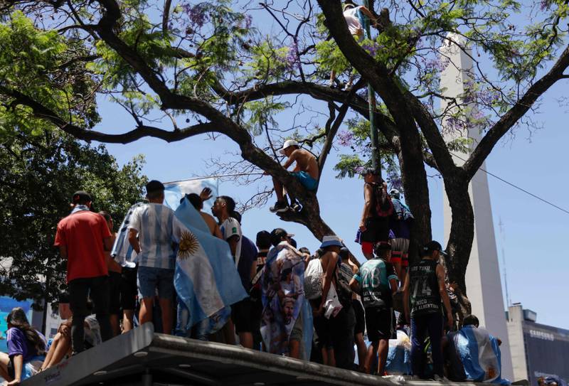 Argentina fans wait to greet their World Cup heroes. AFP