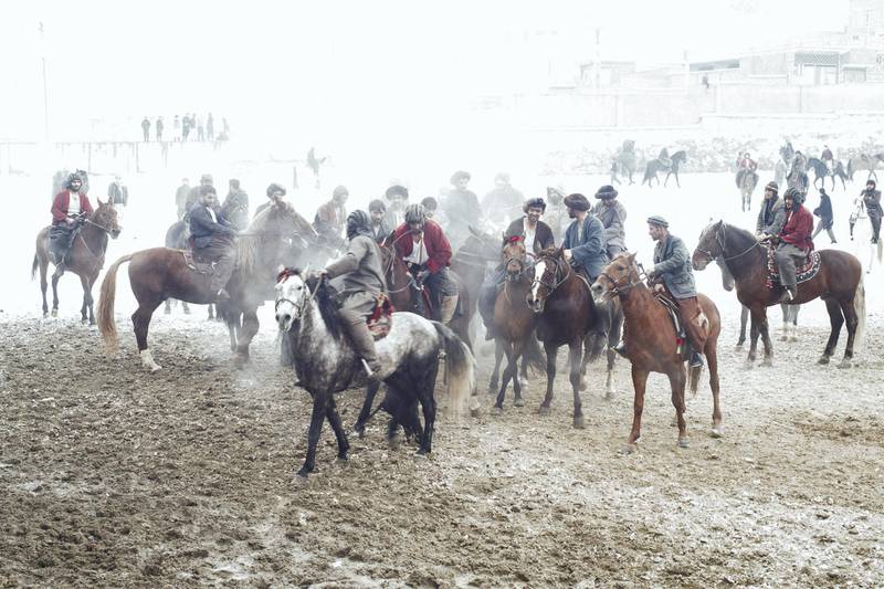 January 11, 2019 - Kabul, Kabul, Afghanistan: Bozkashi is a sport with roots to nomadic tribes in Central Asia. The game involves teams of horsemen fighting for the carcass of a calf or a goat and placing it within the goal area.Bozkashi was banned in Afghanistan during the Taliban regime. It was considered "unislamic" by the fundamentalist group. The sport has seen a resurgence since the fall of the Taliban in 2001. The recent rise of the Taliban may threaten it existence as the group moves to normalize its image as a political party.(Ivan Flores/Polaris)