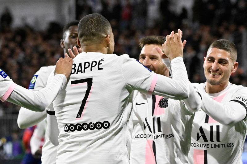 Kylian Mbappe celebrates with teammates after scoring for PSG against Clermont. AFP