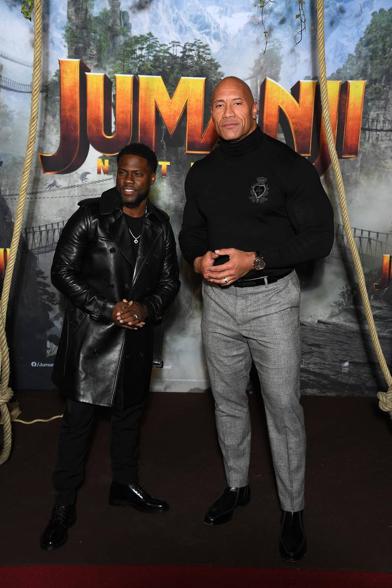 PARIS, FRANCE - DECEMBER 03: Kevin Hart and Dwayne Johnson attend the photocall of  "Jumanji : Next Level" film at le Grand Rex on December 03, 2019 in Paris, France. (Photo by Pascal Le Segretain/Getty Images)
