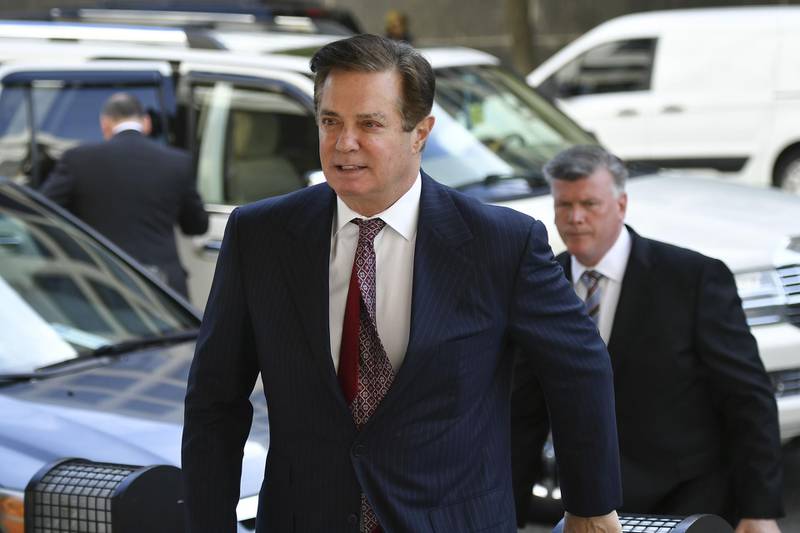 (FILES) In this file photo taken on June 15, 2018 Paul Manafort arrives for a hearing at US District Court on June 15, 2018 in Washington, DC. - Manafort was found guilty on 8 charges of tax and bank fraud and the judge declared a mistrial on 10 other counts, on August 21, 2018. (Photo by MANDEL NGAN / AFP)