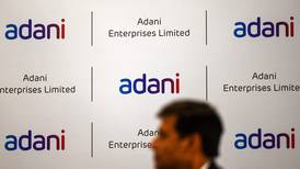 Adani Enterprises shares climb 6% but other group stocks dive