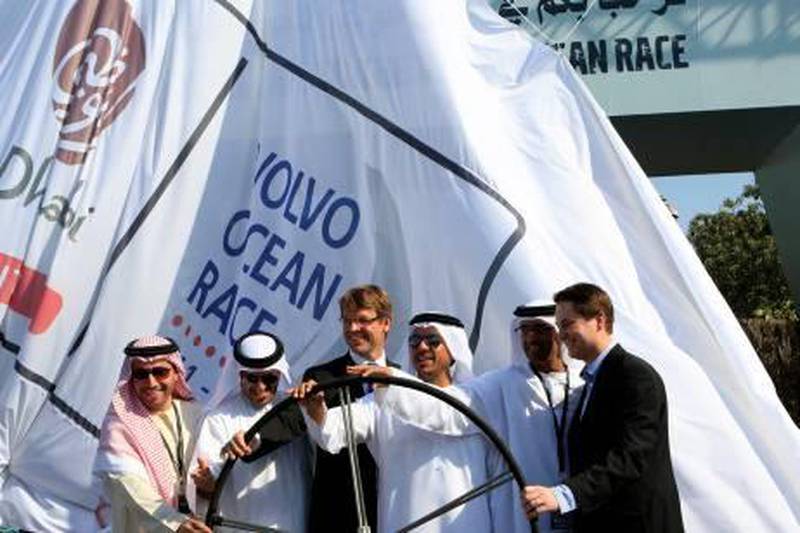 ABU DHABI - 31DEC2011 - Sheikh Sultan bin Tahnoon al Nahyan (third right) Chairman of the ADTA and TDIC, Knut Frostad (thrid left) CEO, Volvo Ocean Race, Mubarak Hamad al Muhairi (second left) Director General, ADTA with other official opens the Abu Dhabi's Volvo Ocean Race Destination Village at the Corniche breakwater yesterday in Abu Dhabi. Ravindranath K / The National 
