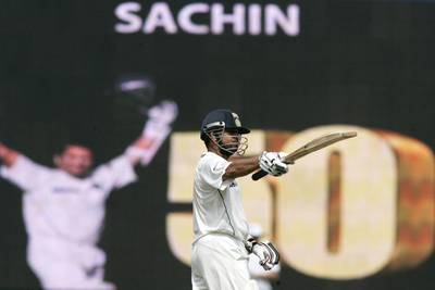 Sachin Tendulkar has seen Indian cricket through tough times such as a hundred against England in the aftermath of a terror attack in 2008 . Bikas Das / AP Photo