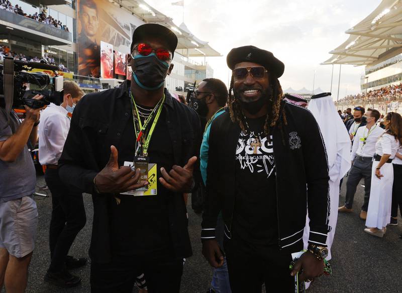 Sprinting legend Usain Bolt and West Indies cricket icon Chris Gayle at the Abu Dhabi Grand Prix on Sunday. Reuters