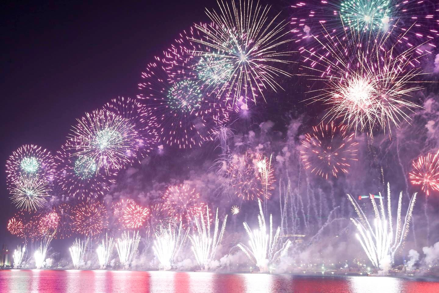 Grand fireworks light up the night sky along Abu Dhabi's Corniche for UAE at 50 celebrations in Abu Dhabi. Khushnum Bhandari / The National