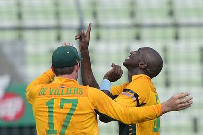 South Africa spinner Eddie Leie, right, reacts after a dismissal during South Africa's Twenty20 win over Bangladesh on Tuesday in Dhaka. Munir uz Zaman / AFP / July 7, 2015