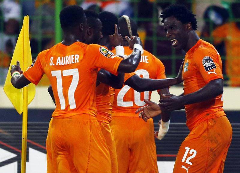 Wilfried Bony, right, celebrates his first goal during the Ivory Coast's African Cup of Nations quarter-final against Algeria. Amr Abdallah Dalsh / Reuters