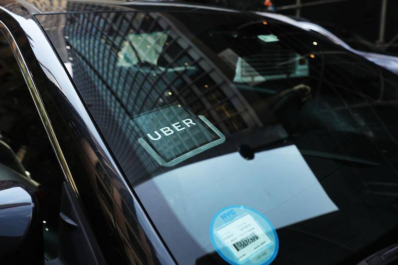 NEW YORK, NY - JUNE 14: An Uber car waits for a client in Manhattan a day after it was announced that Uber co-founder Travis Kalanick will take a leave of absence as chief executive on June 14, 2017 in New York City. The move came after former attorney general Eric H. Holder Jr. and his law firm, Covington & Burling, released 13 pages of recommendations compiled as part of an investigation of sexual harassment at the ride-hailing car service.   Spencer Platt/Getty Images/AFP