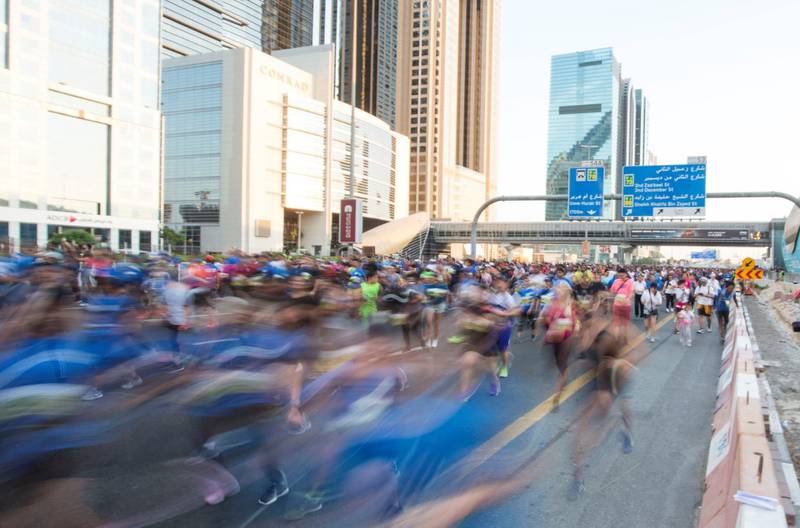 Dubai, United Arab Emirates - Participants from all walks of life running  at the Dubai 30x30 Run at Sheikh Zayed Road.  Leslie Pableo for The National
