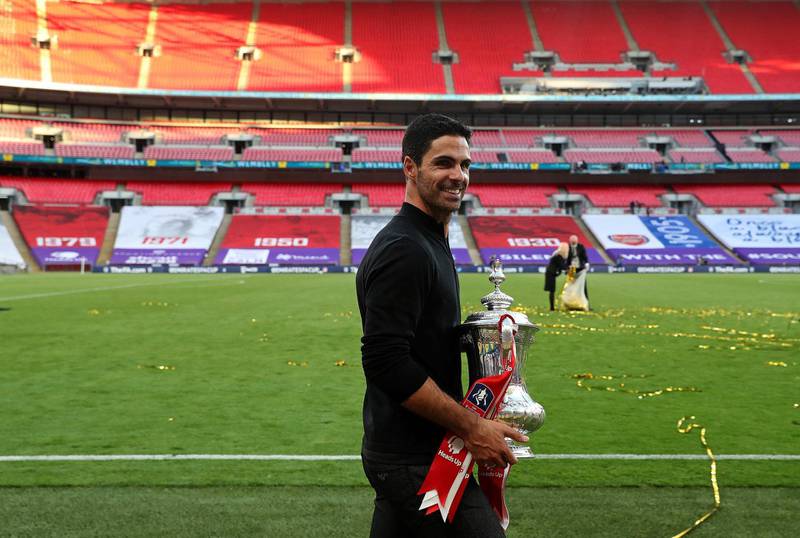 Mikel Arteta with the FA Cup at Wembley. AFP