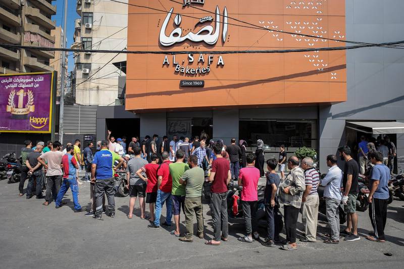 Crowds outside a local bakery in Beirut. Hasan Shaaban/Bloomberg