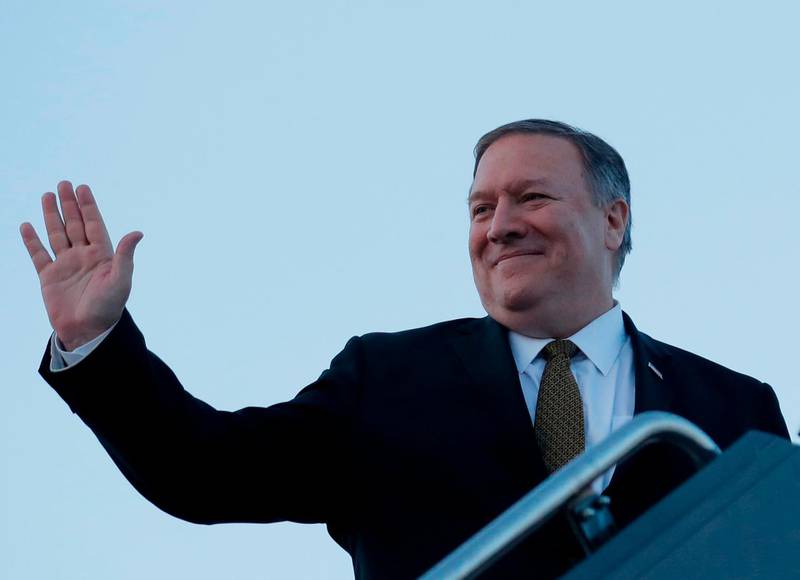 U.S. Secretary of State Mike Pompeo boards his plane in Kansas City, Missouri, on March 18, 2019. Secretary of State Mike Pompeo was in Kansas City Monday to speak at the Global Entrepreneurship Summit. / AFP / POOL / JIM YOUNG
