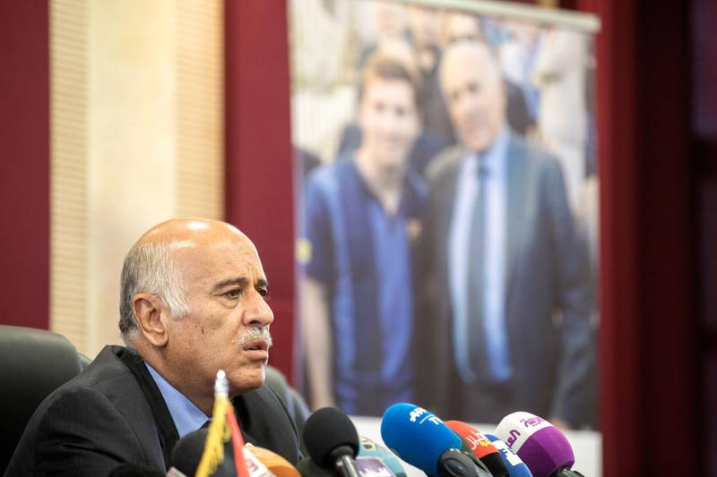 epa06788594 Palestinian chief of Football Associations Jibril Rajoub, speaks and in the background his picture with Argentinian soccer player Lionel Messi, during a press conference in the West Bank town of Ramallah, 07 June 2018. Rajoub referred to the cancellation of Argentina's friendly soccer match against Israel's national team that was schedule in Jerusalem on 09 June and said that this is a correct step.  EPA/ATEF SAFADI