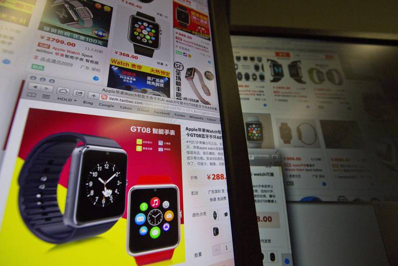 An e-commerce website with a vendor selling the Apple Smart Watch Bluetooth Bracelet starting from 288 yuan (US$45) is displayed on a computer screen in Beijing. Ng Han Guan / AP Photo