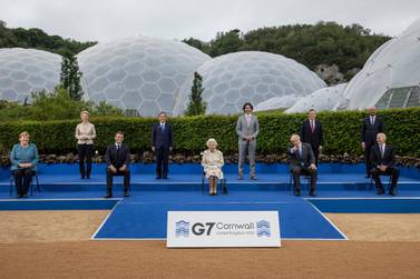 G7 leaders pose with Queen Elizabeth II in Cornwall, UK. WPA Pool / Getty Images
