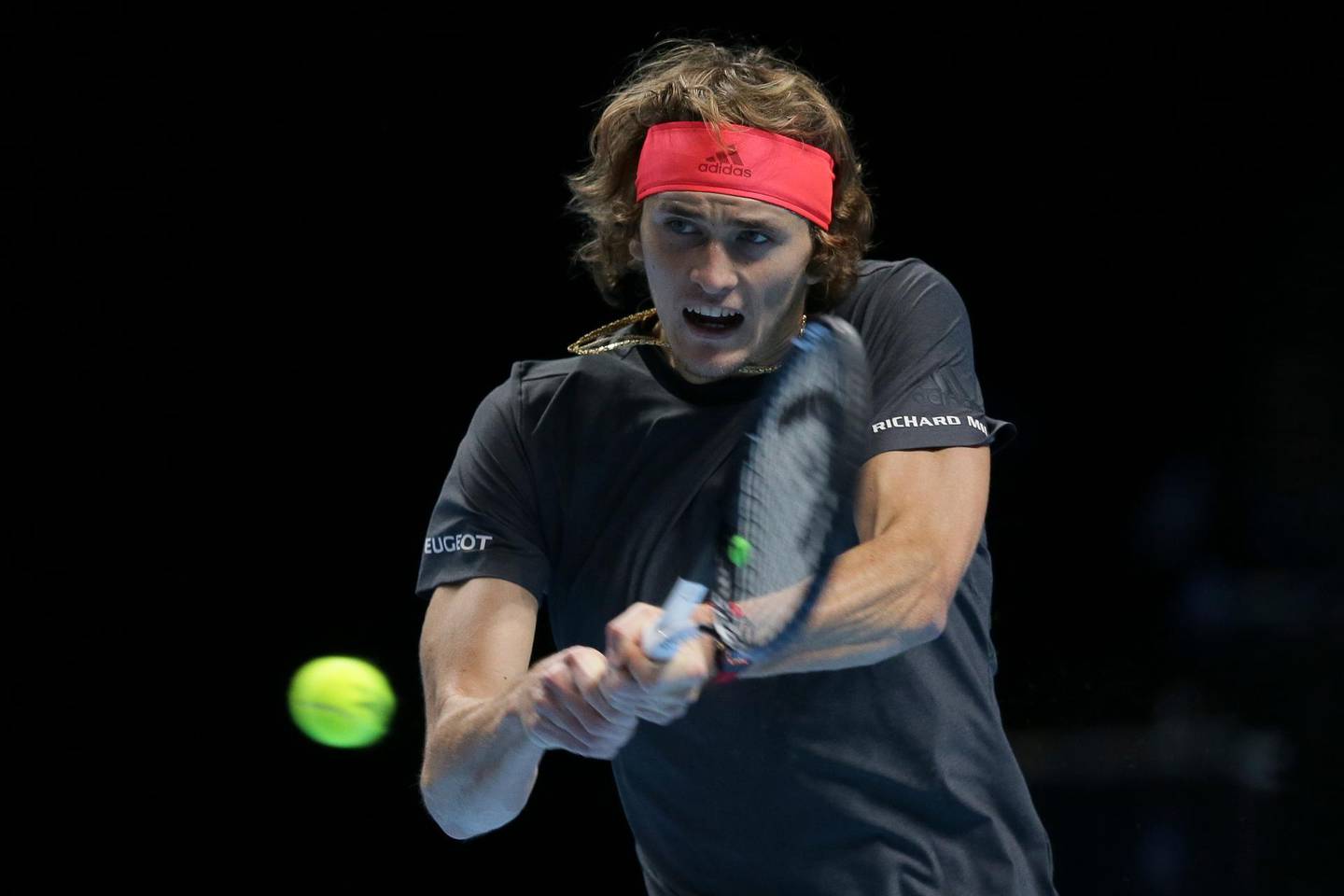 FILE - In this Nov. 17, 2018, file photo, Alexander Zverev of Germany plays a return to Roger Federer of Switzerland in their ATP World Tour Finals singles tennis match at O2 Arena in London. Zverev is one of the men to keep an eye on at the Australian Open, Jan. 14-27, 2019. (AP Photo/Tim Ireland, File)