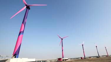 Pink-coloured turbines installed by Octopus Energy at Expo City Dubai. EPA