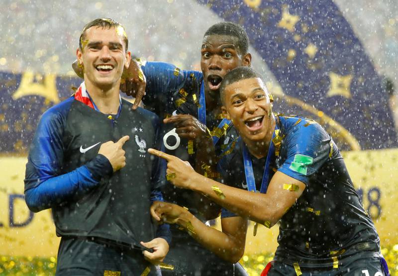Soccer Football - World Cup - Final - France v Croatia - Luzhniki Stadium, Moscow, Russia - July 15, 2018  France's Antoine Griezmann, Paul Pogba and Kylian Mbappe celebrate after winning the World Cup  REUTERS/Kai Pfaffenbach    TPX IMAGES OF THE DAY    SEARCH "FIFA BEST" FOR ALL PICTURES.
