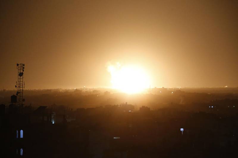 A ball of fire is seen following an Israel airstrike at Rafah in the southern Gaza Strip.  AFP