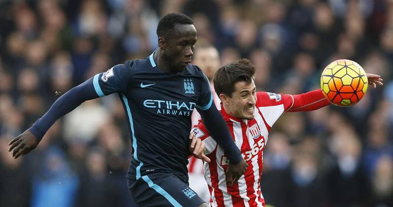 Manchester City’s Bacary Sagna in action with Stoke City’s Bojan Krkic. Reuters / Carl Recine