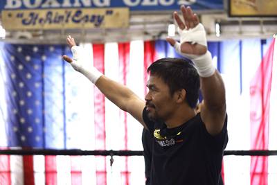 Manny Pacquiao poses for media at Wild Card Boxing Club in Los Angeles, California.