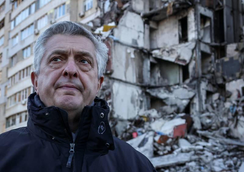 Filippo Grandi, the UN High Commissioner for Refugees, looks at the damage to the residential area of Saltivka in Kharkiv city during a visit to Ukraine.  Reuters