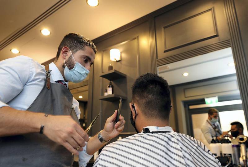 Dubai, United Arab Emirates - Reporter: Kelly Clark. News. Jhet has his hair cut by Sami. Free haircuts for people left unemployed during COVID for month of Ramadan. Monday, April 19th, 2021. Dubai. Chris Whiteoak / The National