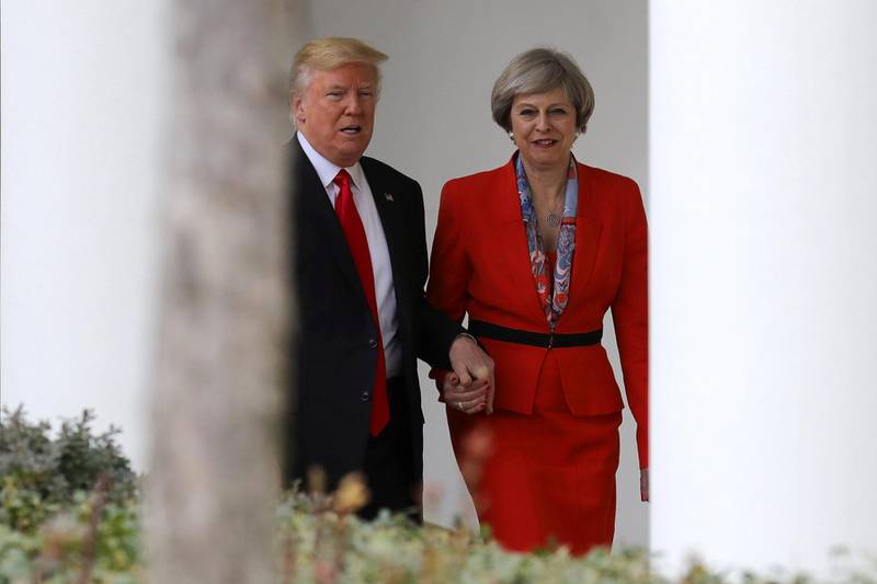 WASHINGTON, DC - JANUARY 27:  British Prime Minister Theresa May with U.S. President Donald Trump walk along The Colonnade at The White House on January 27, 2017 in Washington, DC. British Prime Minister Theresa May is on a two-day visit to the United States and will be the first world leader to meet with President Donald Trump.  (Photo by Christopher Furlong/Getty Images)