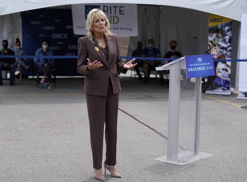 Jill Biden, in a coordinated brown suit, speaks in Grand Rapids, Michigan on May 27, 2021. AFP