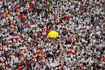 One year ago, a sea of humanity, a million people by some estimates, marched through central Hong Kong on a steamy afternoon. AP