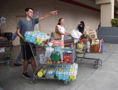Shoppers at Costco in Miami queued for up to eight hours for water and other essentials in preparation of Hurricane Irma. Michele Eve Sandberg/ AFP Photo