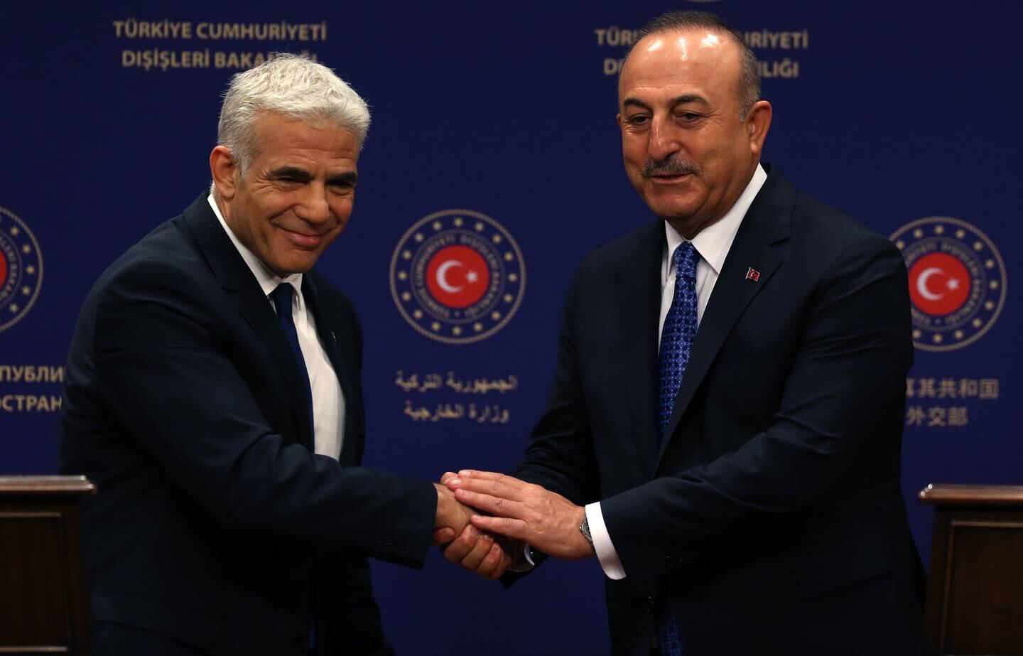 Turkish Foreign Minister Mevlut Cavusoglu (R) and Israeli Foreign Minister Yair Lapid (L) attend a press conference after their meeting in Ankara, Turkey. EPA / STR