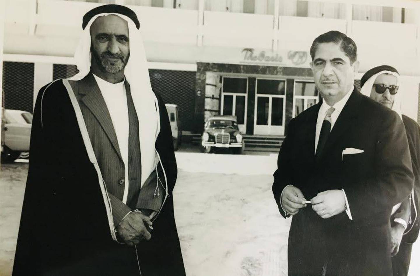Sheikh Rashid bin Saeed, Ruler of Dubai at the time, with Adi Bitar, Secretary General of the Trucial States Council.