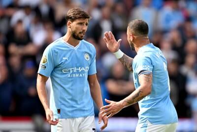 Ruben Dias and Kyle Walker of Manchester City argue. Getty 