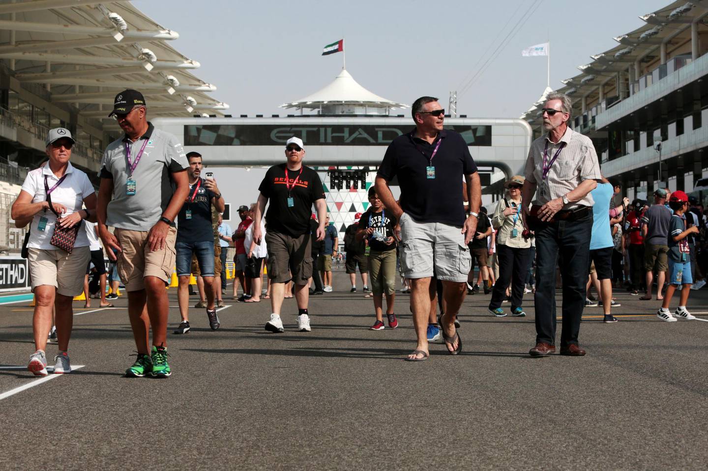 Abu Dhabi, United Arab Emirates, November 24, 2016:    Fans walk along the starting grid during previews for the Abu Dhabi Formula One Grand Prix at Yas Marina Circuit in Abu Dhabi on November 24, 2016. Christopher Pike / The National

Job ID: 
Reporter: Graham Caygill, Jonathan Raymond
Section: Sport
Keywords:  *** Local Caption ***  CP1124-sp-f1-06.JPG