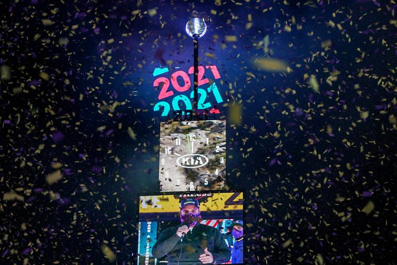 Confetti flies around the ball and countdown clock in Times Square during the virtual New Year's Eve event following the outbreak of the coronavirus disease (COVID-19) in the Manhattan borough of New York City, New York, U.S. Reuters